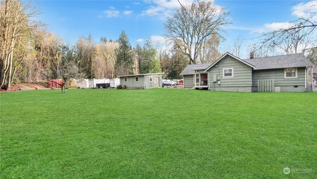 a view of a house with a street
