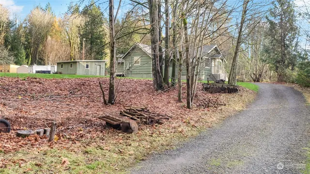 a view of a city with lush green forest