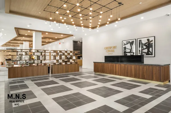 a bathroom with a sink a toilet and bathtub