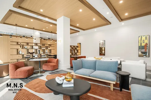 a view of a hallway with a couch