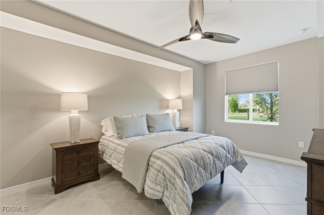 44000 Boardwalk Loop, Unit 1312 Punta Gorda, FL 33982 - Photo 24 of 48 a bedroom with a bed and a window