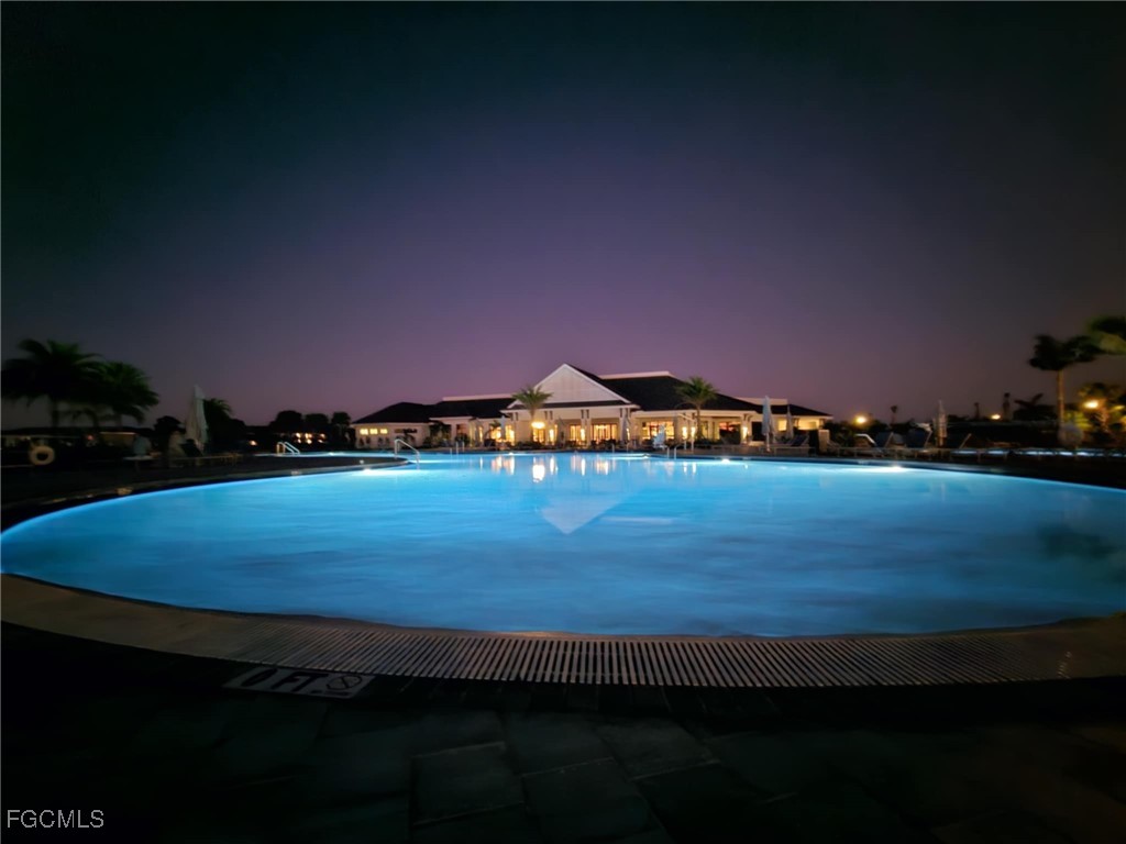 44000 Boardwalk Loop, Unit 1312 Punta Gorda, FL 33982 - Photo 31 of 48 a view of a big yard with an empty space