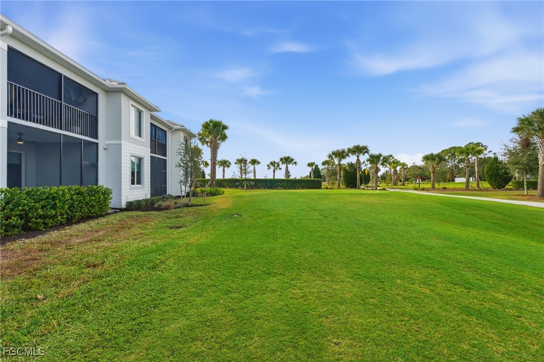 44000 Boardwalk Loop, Unit 1312 Punta Gorda, FL 33982 - Photo 33 of 48 a view of building with yard