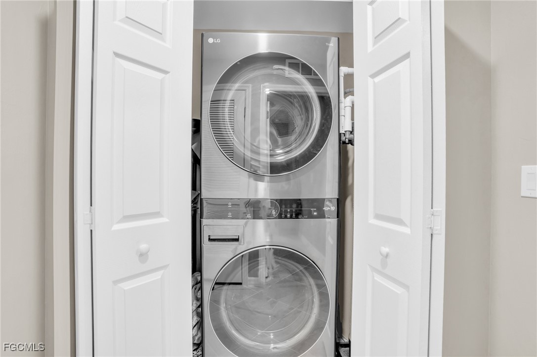 44000 Boardwalk Loop, Unit 1312 Punta Gorda, FL 33982 - Photo 36 of 48 a close view of a utility room with dryer and washer