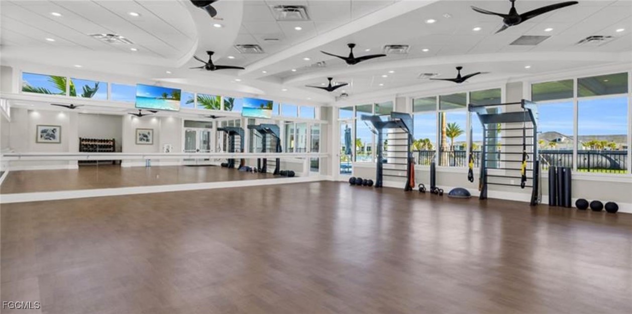 44000 Boardwalk Loop, Unit 1312 Punta Gorda, FL 33982 - Photo 46 of 48 a view of a room with lots of wooden furniture