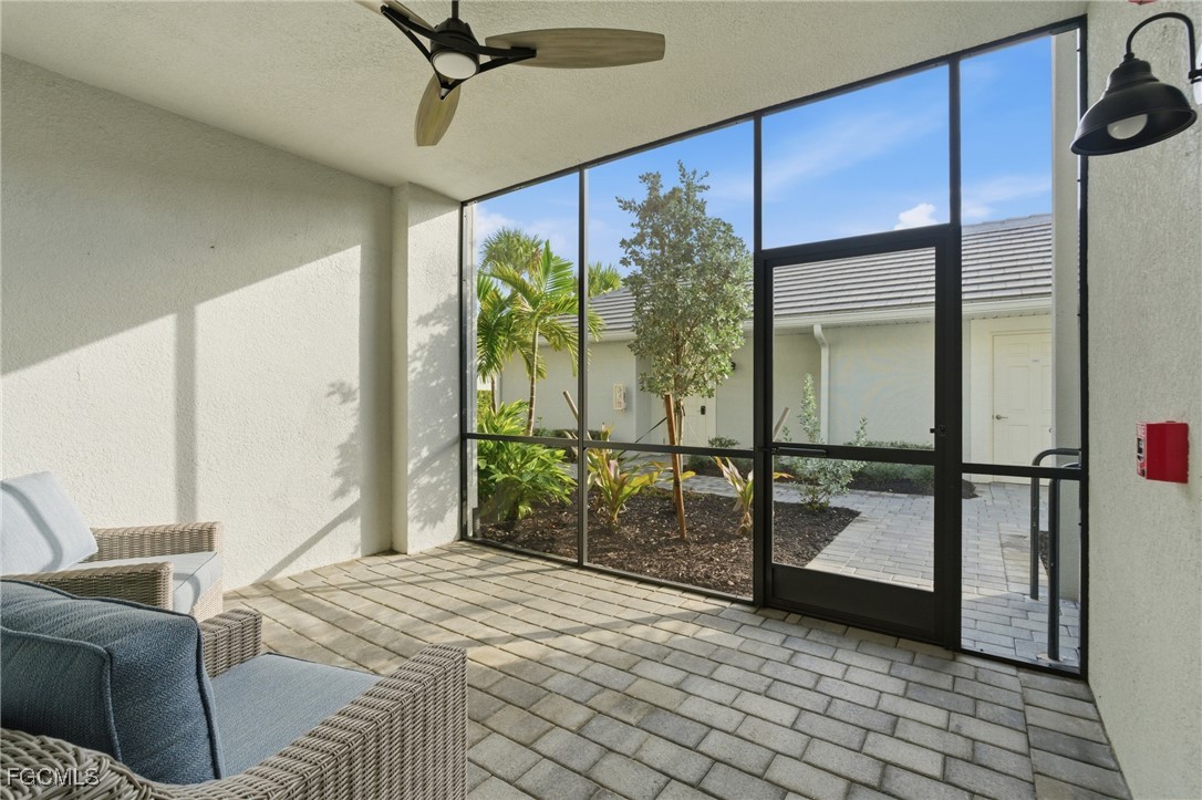 44000 Boardwalk Loop, Unit 1312 Punta Gorda, FL 33982 - Photo 9 of 48 a bedroom with a bed and large window