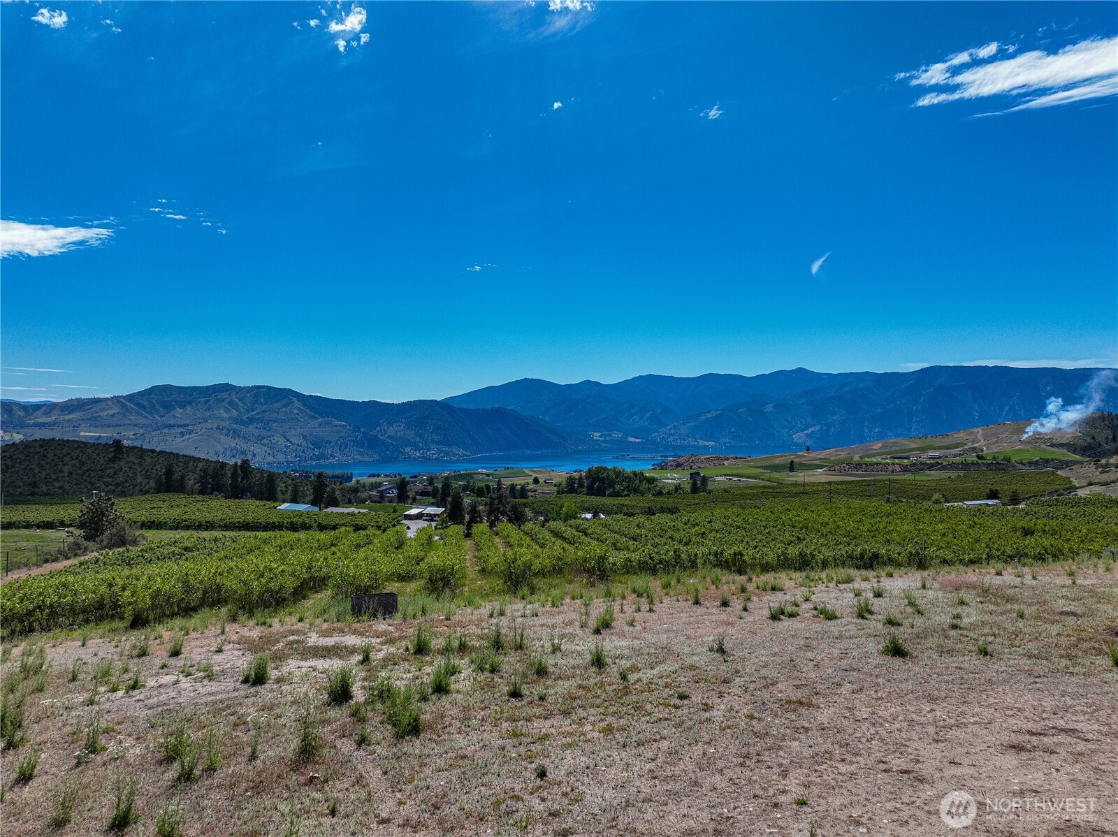 173 Chelan Ranch Road Chelan, WA 98816 - Photo 10 of 11 a view of an outdoor space with mountain view
