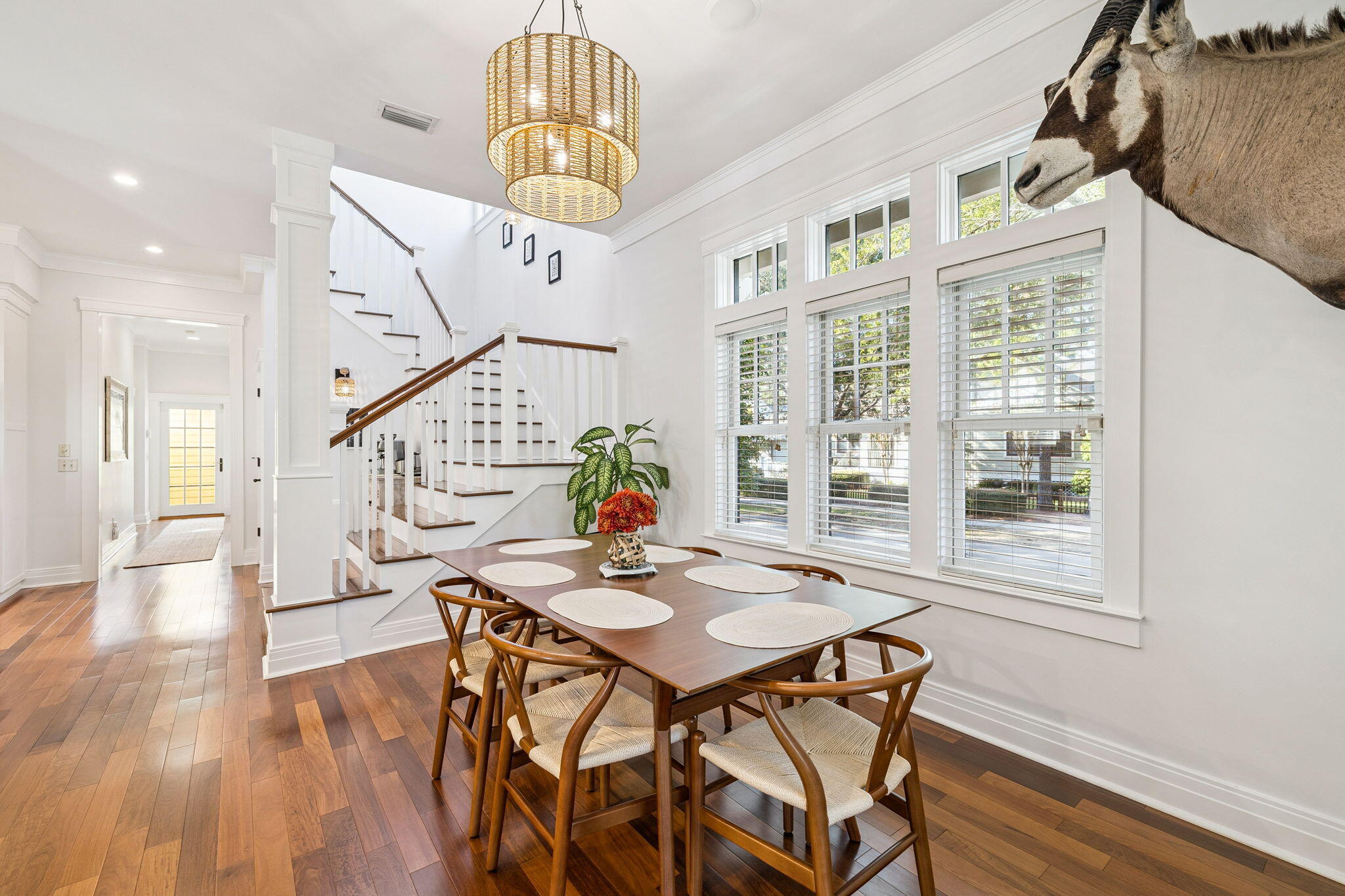 1237 Prospect Promenade Panama City Beach, FL 32413 - Photo 16 of 50 a view of a dining room with furniture window and wooden floor