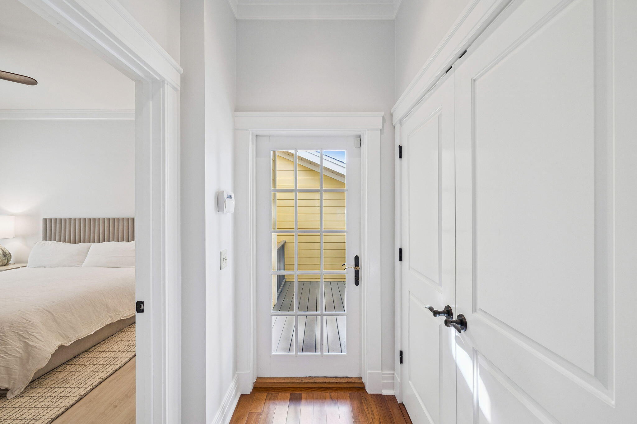 1237 Prospect Promenade Panama City Beach, FL 32413 - Photo 17 of 50 a view of a bedroom from a hallway