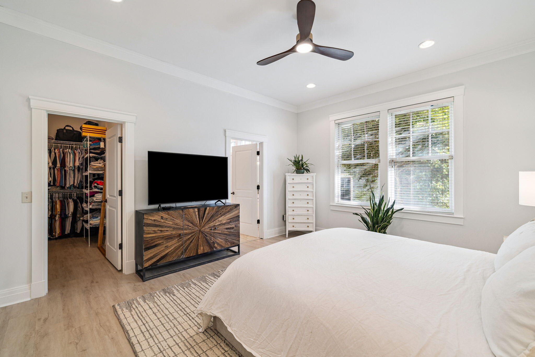 1237 Prospect Promenade Panama City Beach, FL 32413 - Photo 21 of 50 a bedroom with furniture and a flat screen tv