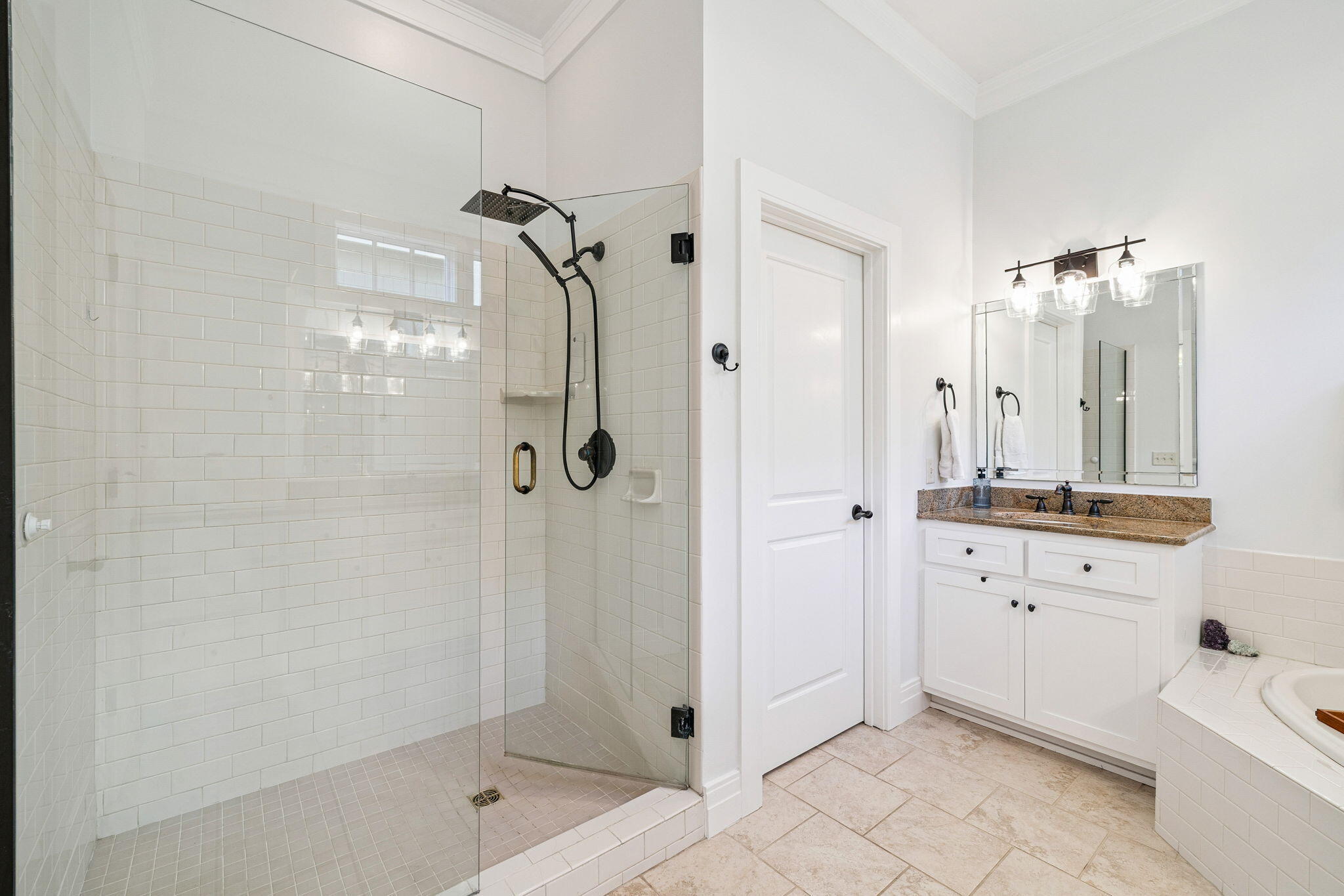 1237 Prospect Promenade Panama City Beach, FL 32413 - Photo 25 of 50 a bathroom with a tub sink shower and two mirror