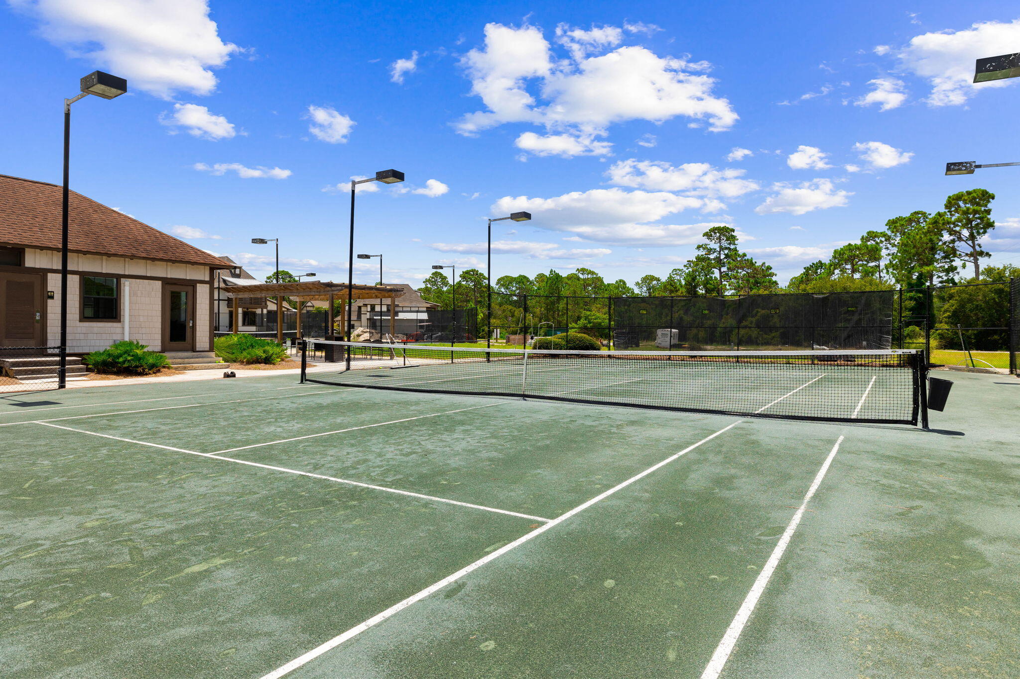 1237 Prospect Promenade Panama City Beach, FL 32413 - Photo 48 of 50 a view of a tennis court