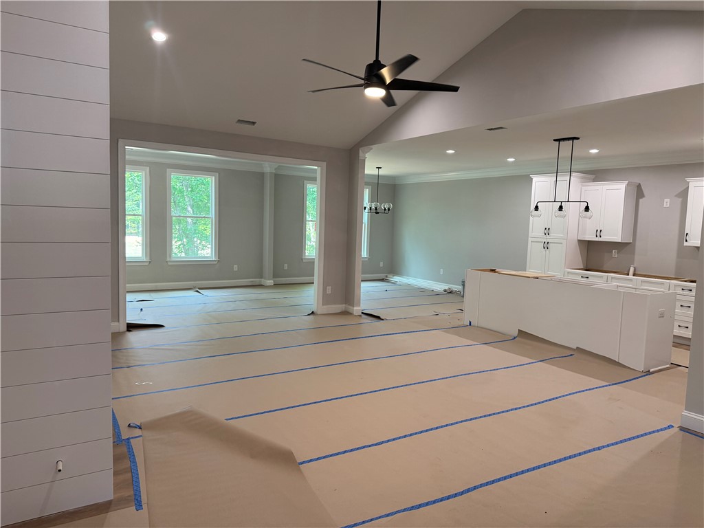513 Quail Hollow Road Anderson, SC 29621 - Photo 9 of 39 This expansive open concept living area seamlessly integrates with a well-appointed kitchen.