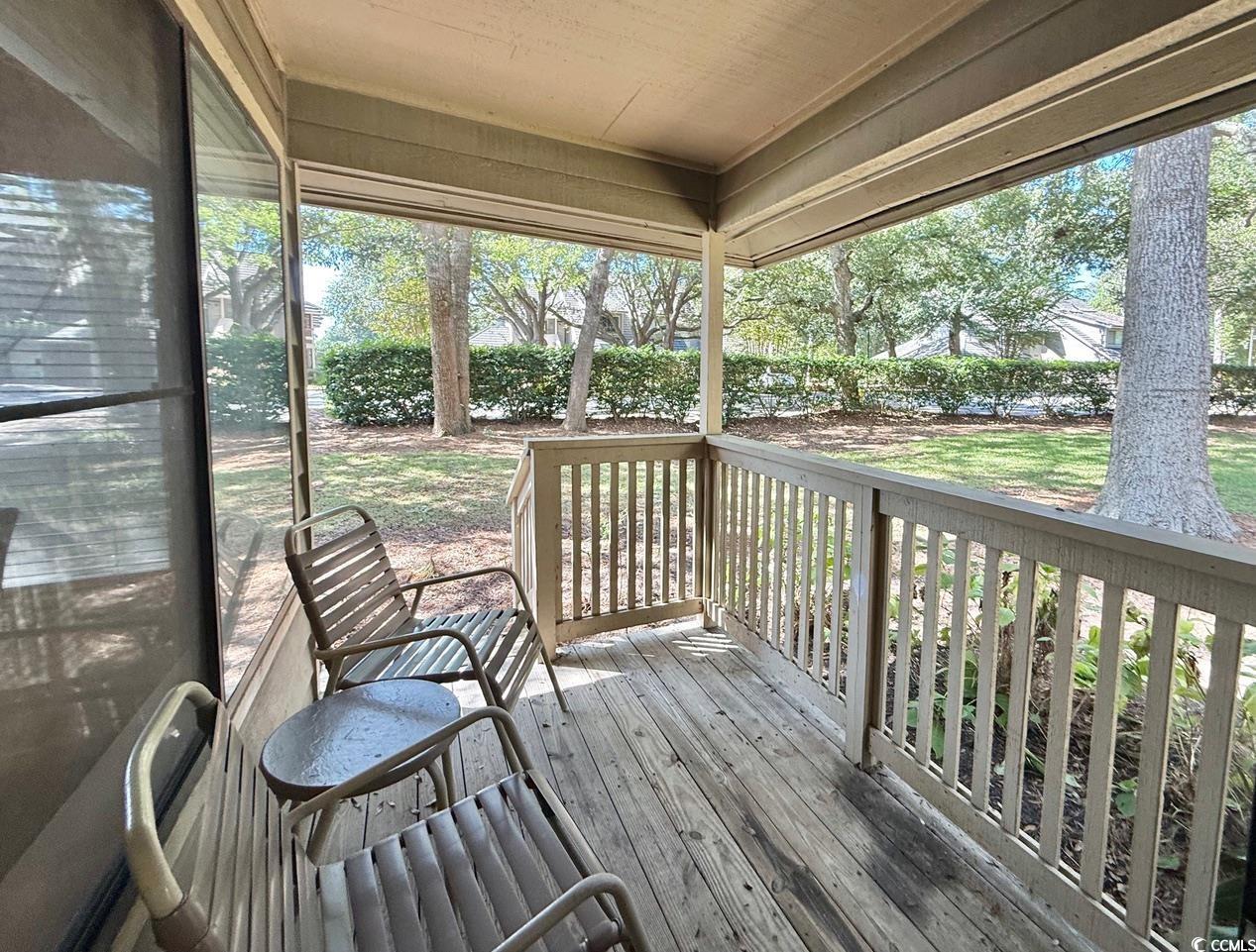404 Melrose Place, Unit 21A Myrtle Beach, SC 29572 - Photo 27 of 30 Deck featuring a yard