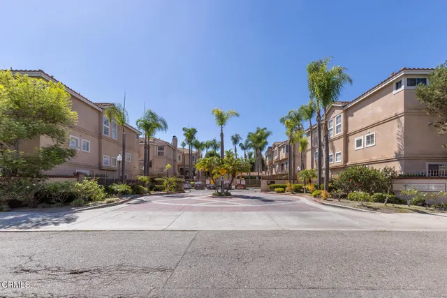 a view of a building with a street