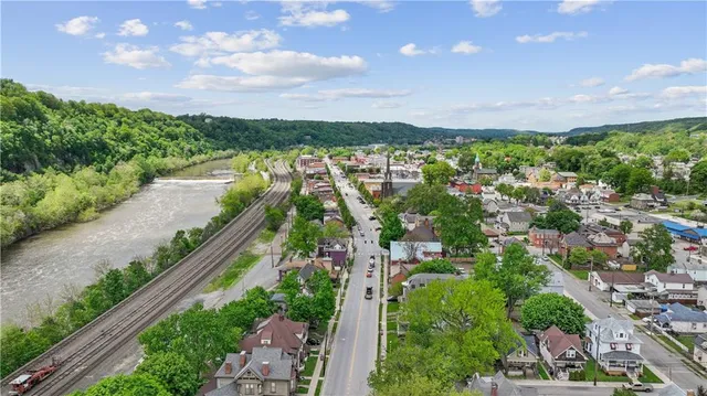 a view of a city with lots of trees