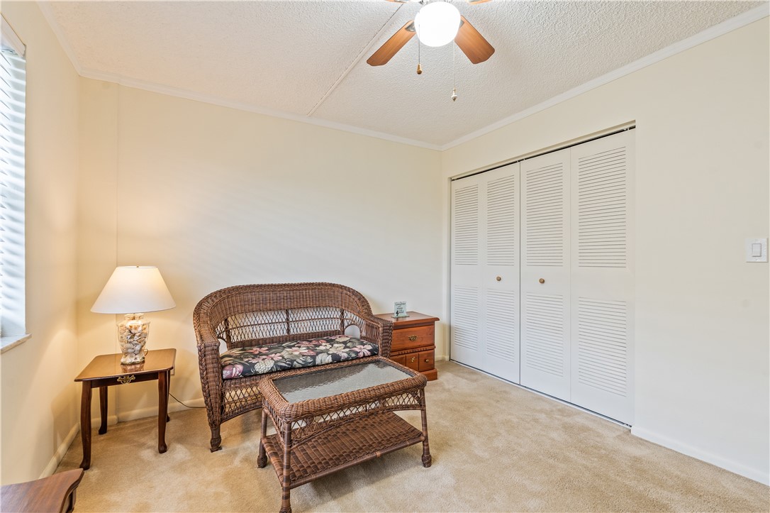 275 Date Palm Road, Unit 403 Vero Beach, FL 32963 - Photo 21 of 35 a living room with furniture