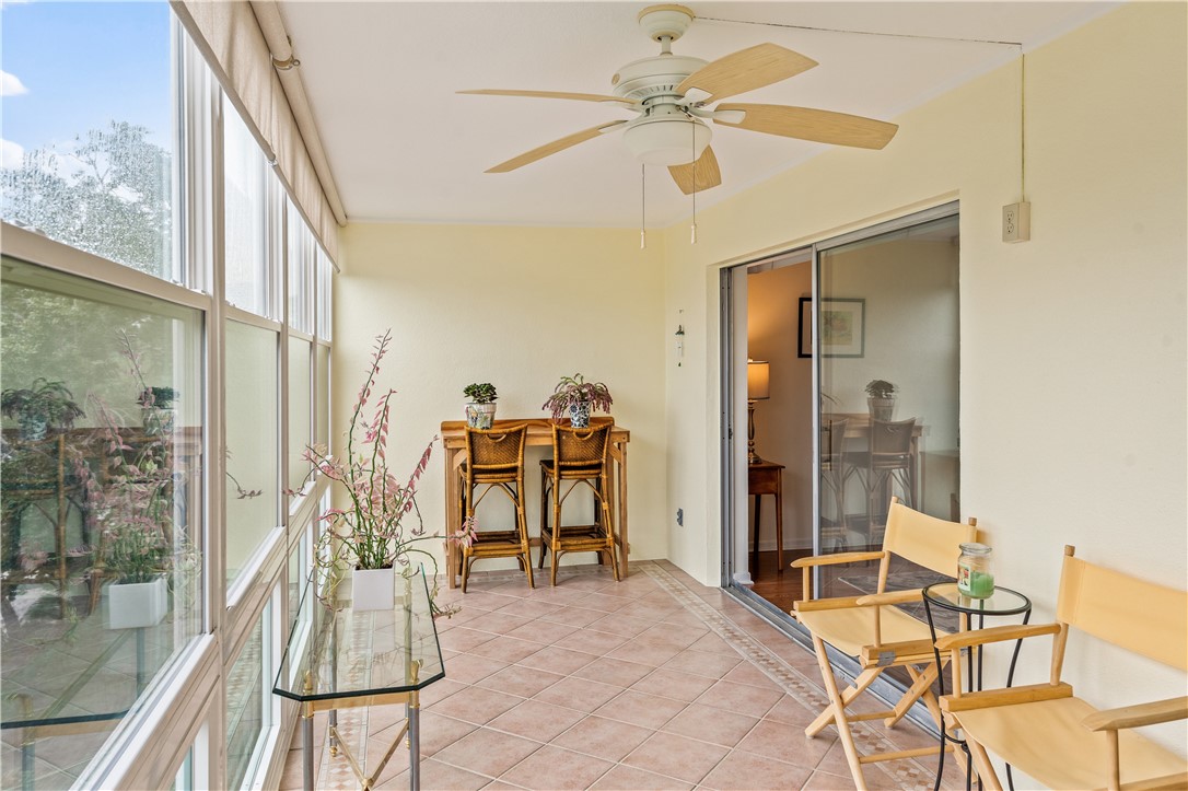 275 Date Palm Road, Unit 403 Vero Beach, FL 32963 - Photo 3 of 35 a view of a livingroom with furniture and a window