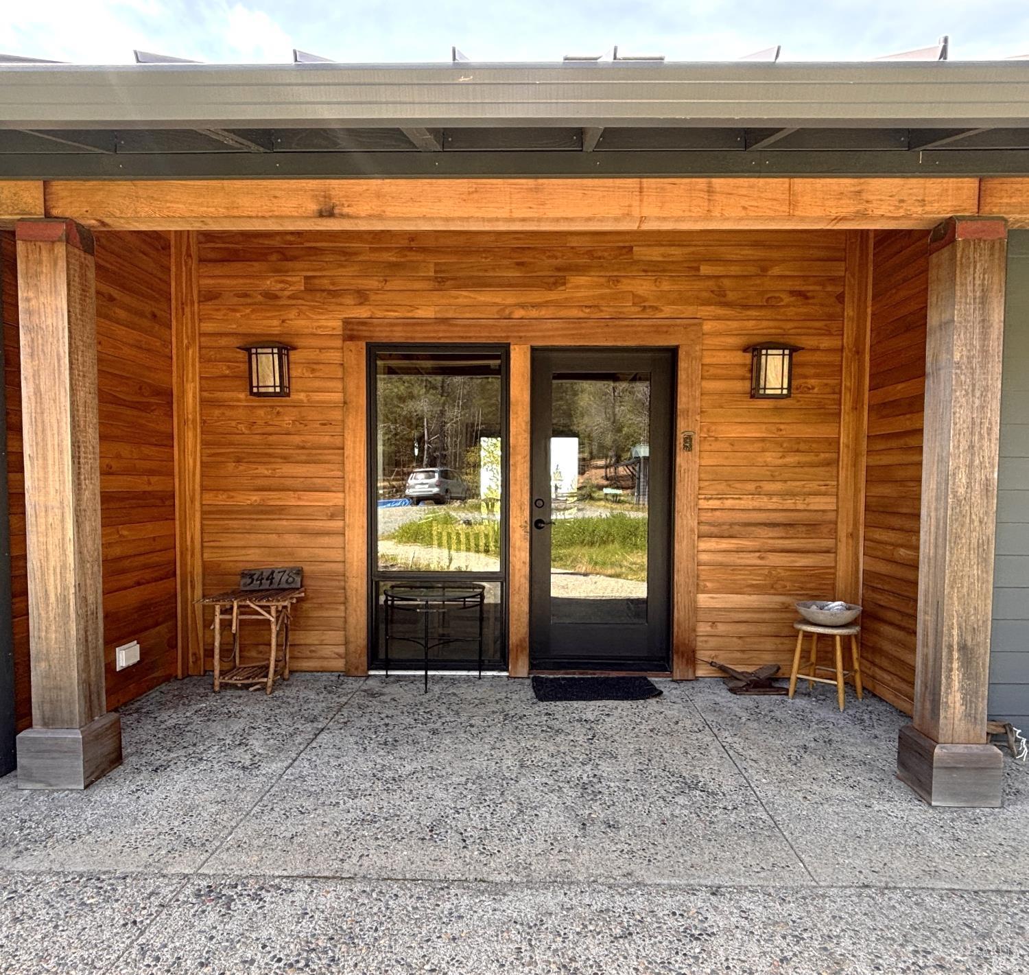 34478 Iversen Road Gualala, CA 95445 - Photo 42 of 43 Lovely porch with the main entry, with the mudroom to the right out of the picture.