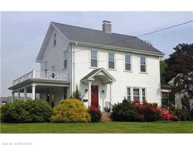 700 Ridge Road Middletown, CT 06457 - Photo 1 of 1 a front view of a house with garden