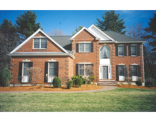 30 Battle Flagg Road Bedford, MA 01730 - Photo 1 of 9 a front view of a house with a yard