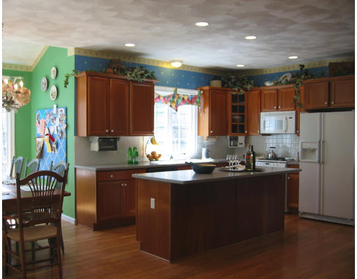 30 Battle Flagg Road Bedford, MA 01730 - Photo 4 of 9 a kitchen with granite countertop a sink stove and cabinets