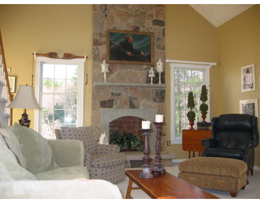30 Battle Flagg Road Bedford, MA 01730 - Photo 5 of 9 a living room with furniture and a fireplace