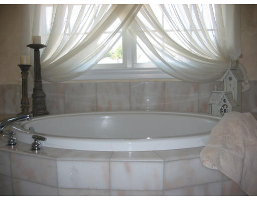 30 Battle Flagg Road Bedford, MA 01730 - Photo 7 of 9 a close up of a bathtub