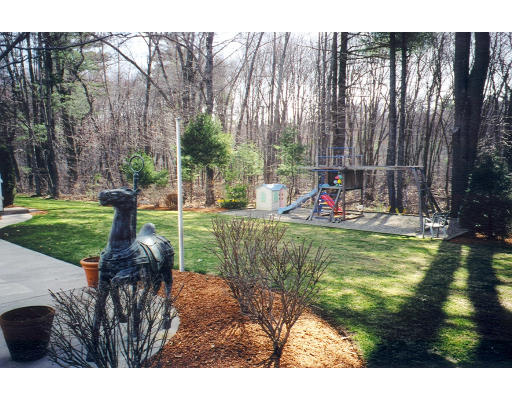 30 Battle Flagg Road Bedford, MA 01730 - Photo 9 of 9 a childrens park with lots of swings and slides