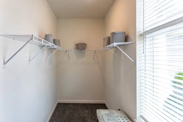 a view of small space with racks on the wall