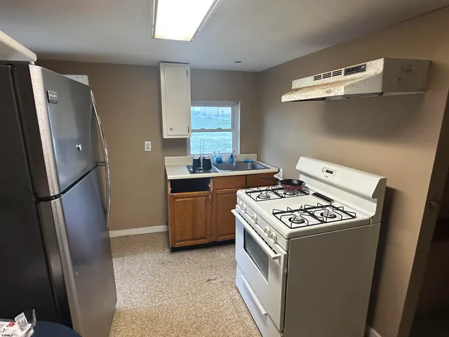 a bathroom with a sink and toilet