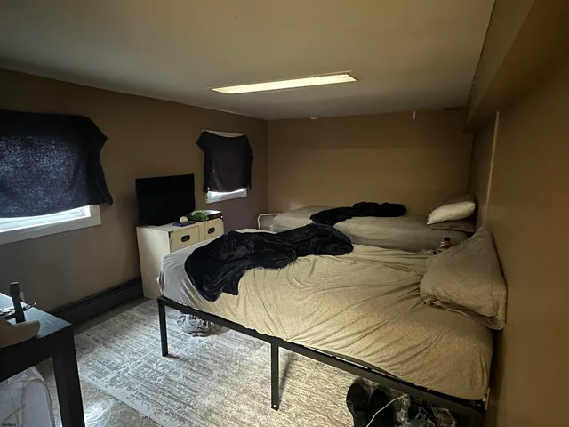 a kitchen with a stove and a refrigerator