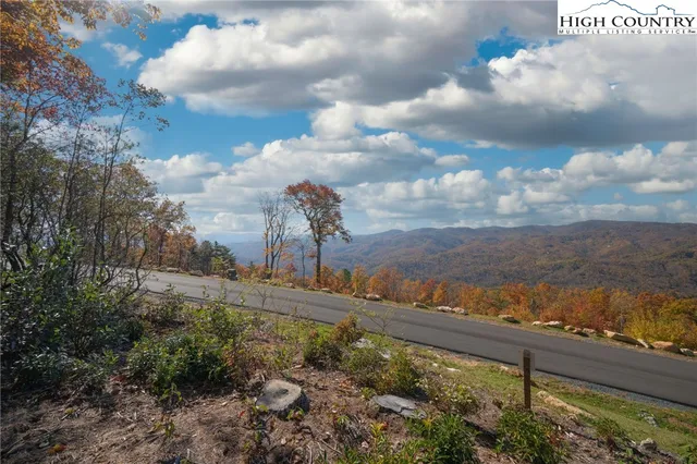 a view of a lake with a city