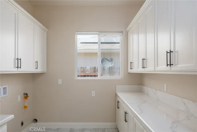 a view of kitchen with wooden floor and window