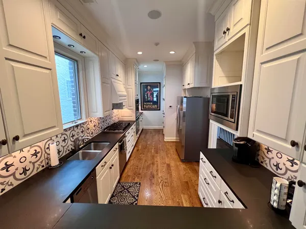 a living room with furniture fireplace and a flat screen tv