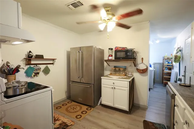 a utility room with washer and dryer