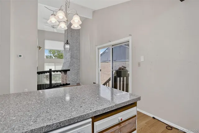 a view of a livingroom with furniture and wooden floor