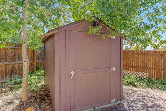 a house view with a backyard space