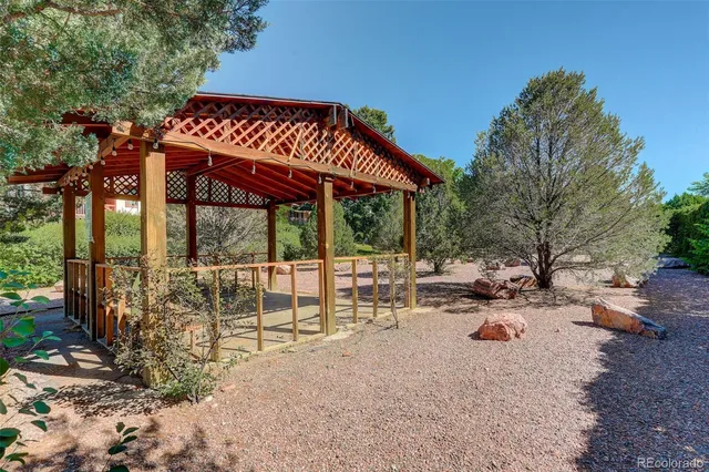 a view of a chairs and tables in the patio