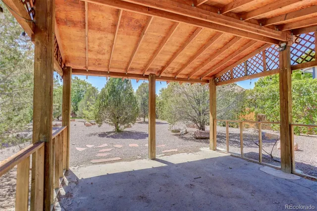 a view of a room with a big yard