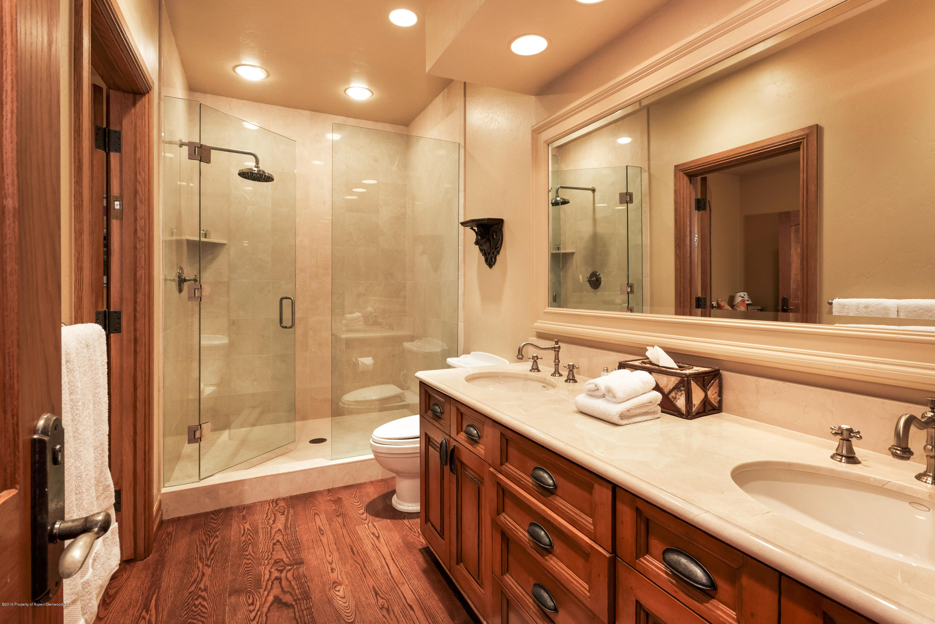 1205 Tiehack Road Aspen, CO 81611 - Photo 19 of 23 a bathroom with a sink double vanity granite tub shower and a mirror