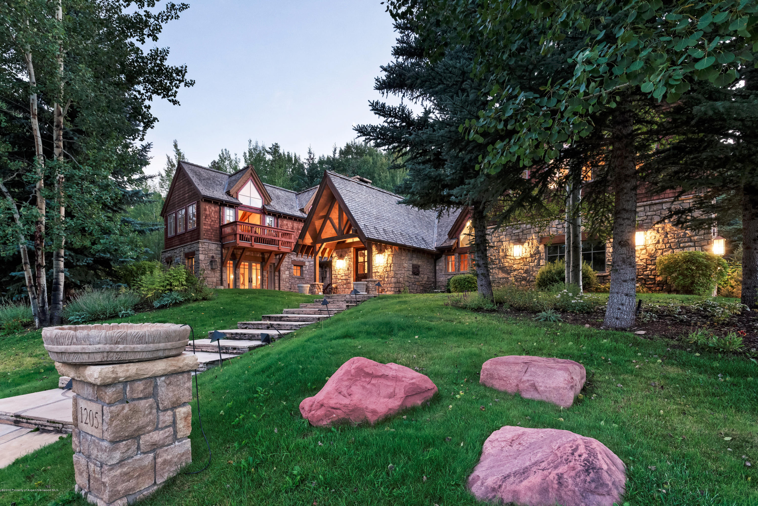 1205 Tiehack Road Aspen, CO 81611 - Photo 2 of 23 a front view of a house with garden