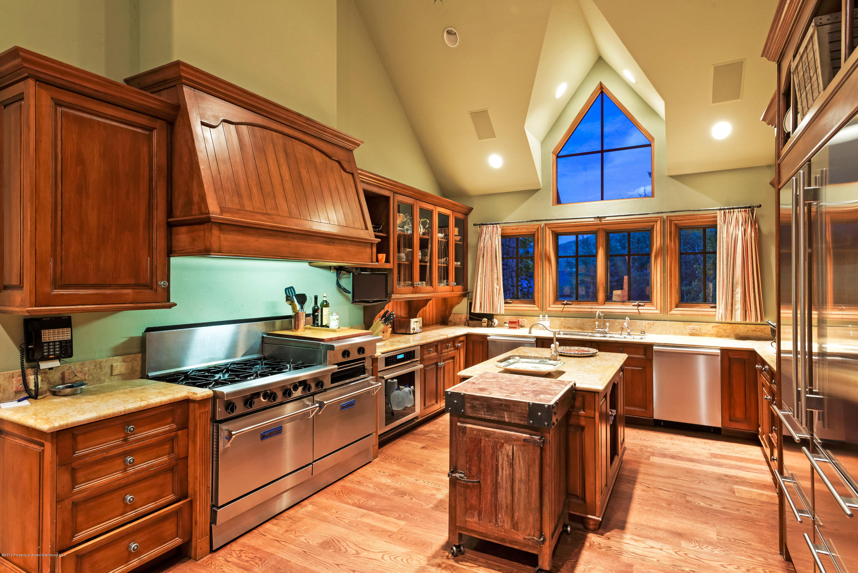 1205 Tiehack Road Aspen, CO 81611 - Photo 5 of 23 a kitchen with stainless steel appliances granite countertop a stove and a sink