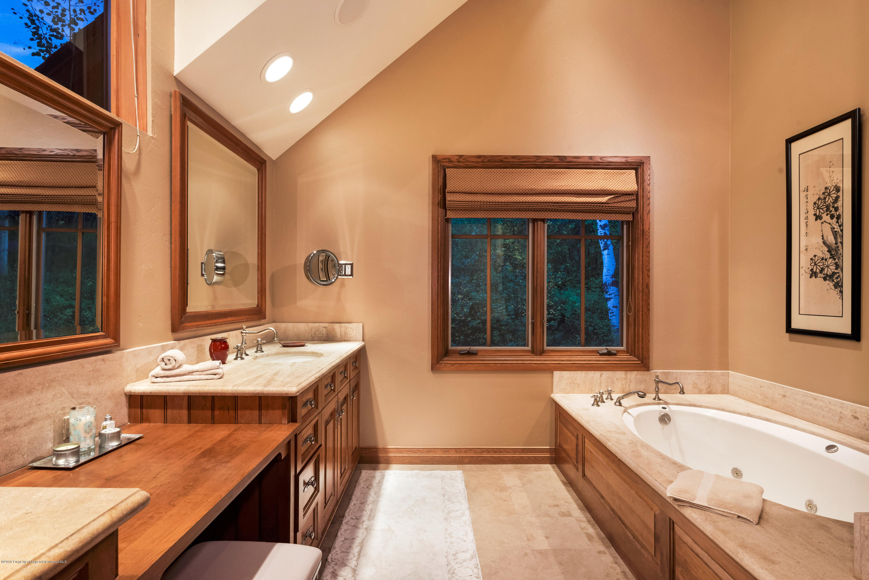 1205 Tiehack Road Aspen, CO 81611 - Photo 8 of 23 a bathroom with a tub double vanity sink and mirror
