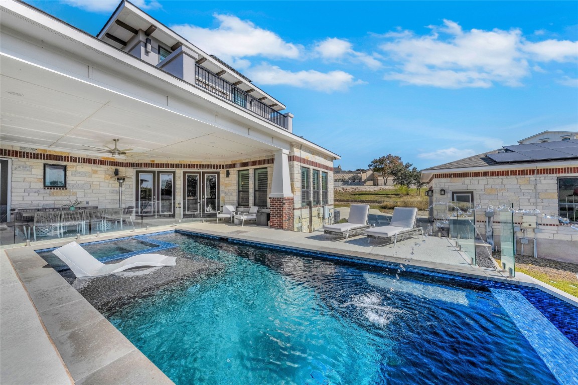 105 Willow Hill Drive Georgetown, TX 78633 - Photo 1 of 1 a view of a house with swimming pool and sitting area