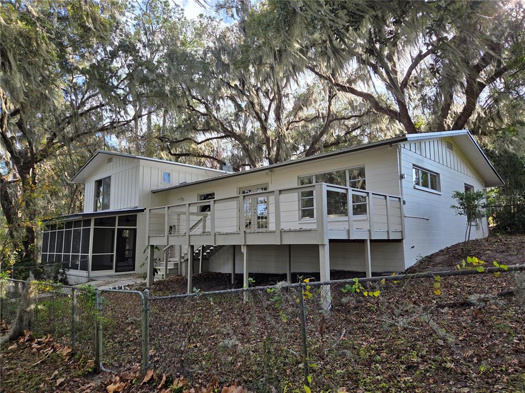 2901 Southwest 4 Court Gainesville, FL 32601 - Photo 15 of 58 a view of a house with a yard and large trees