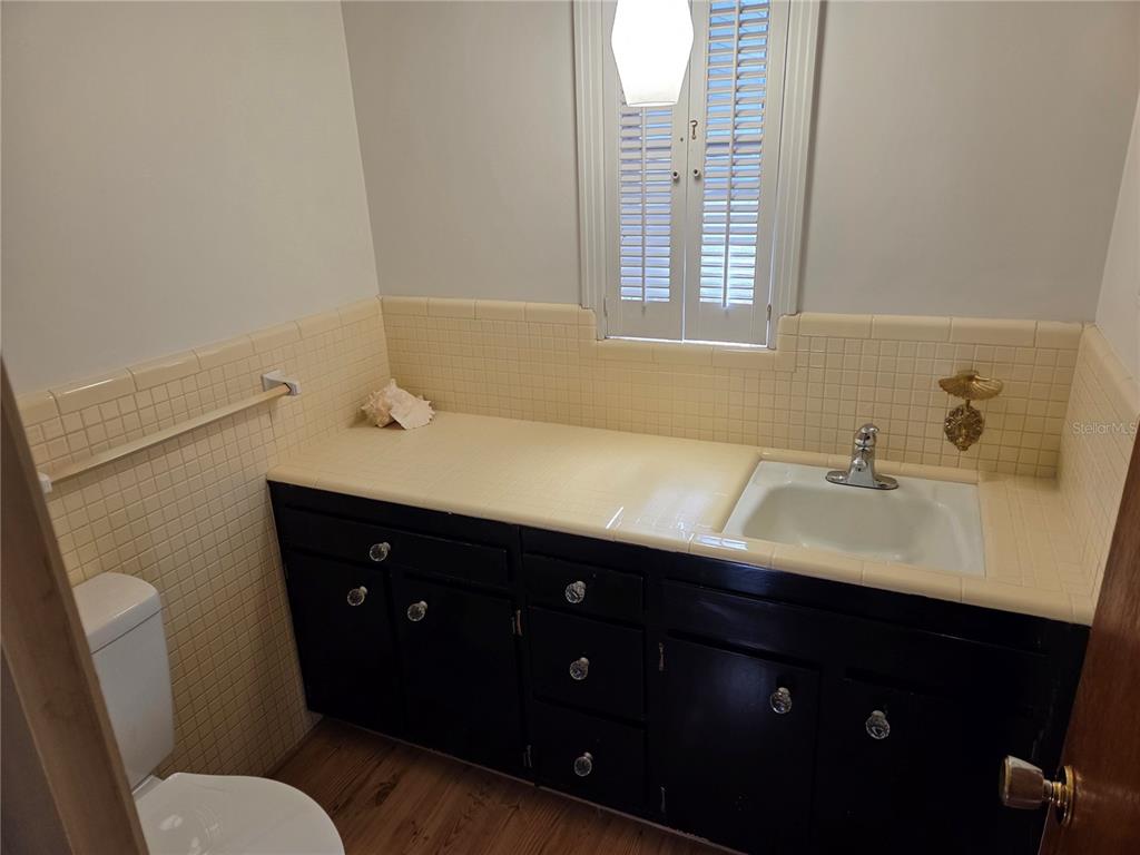 2901 Southwest 4 Court Gainesville, FL 32601 - Photo 24 of 58 a bathroom with a sink vanity and a toilet