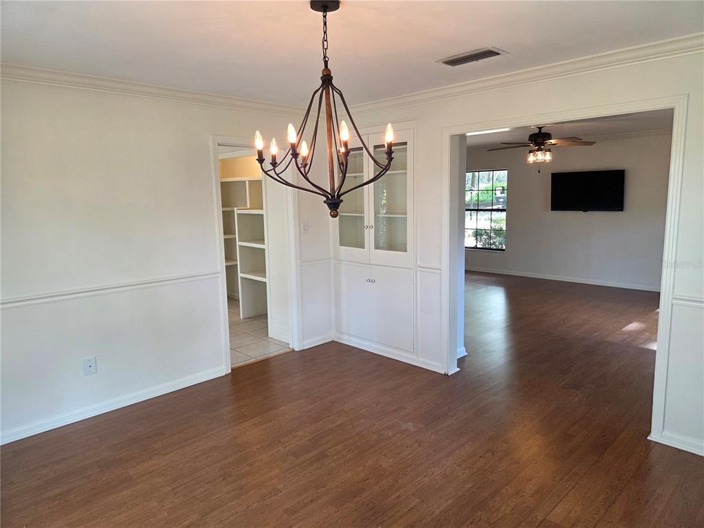 2901 Southwest 4 Court Gainesville, FL 32601 - Photo 37 of 58 a view of empty room with wooden floor and window