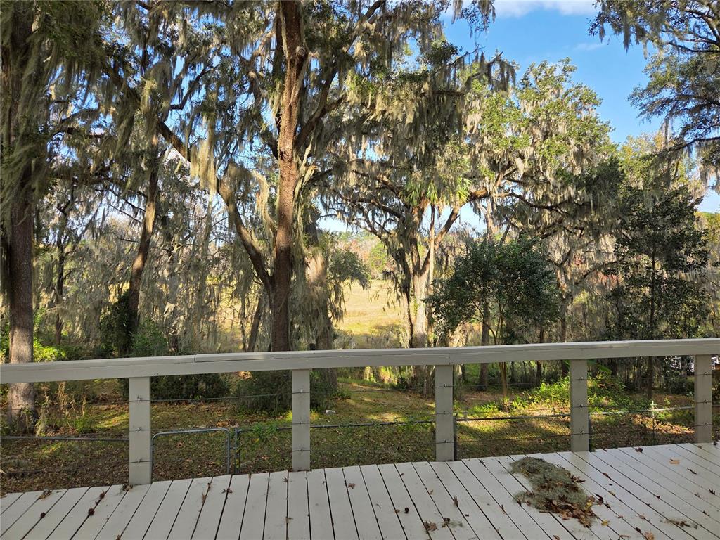 2901 Southwest 4 Court Gainesville, FL 32601 - Photo 38 of 58 a view of balcony with wooden floor and fence