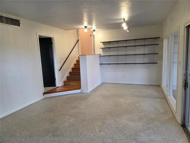 a bathroom with a sink a vanity and a mirror